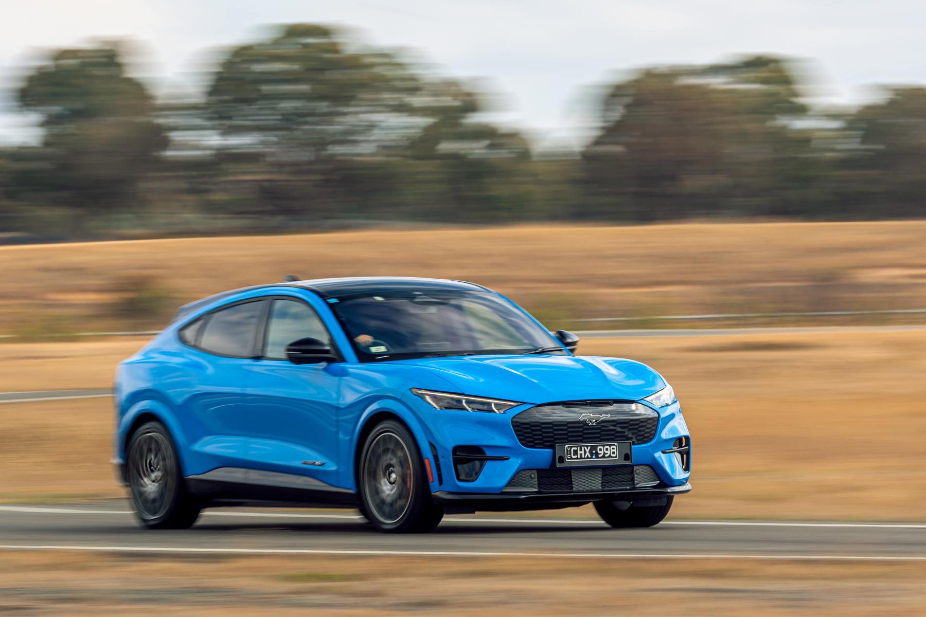 2023 Ford Mustang Mach-E front quarter driving on track